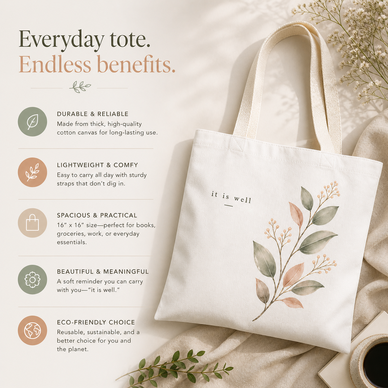 White tote bag with floral design and text 'it is well' on a beige fabric background.